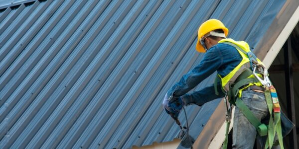 installing metal roof tile on top new roof