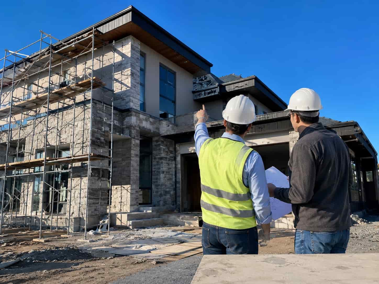General Contractor showing the owner his house progression